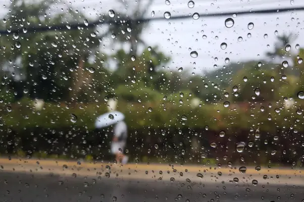 Window Cleaning During Rainy Season